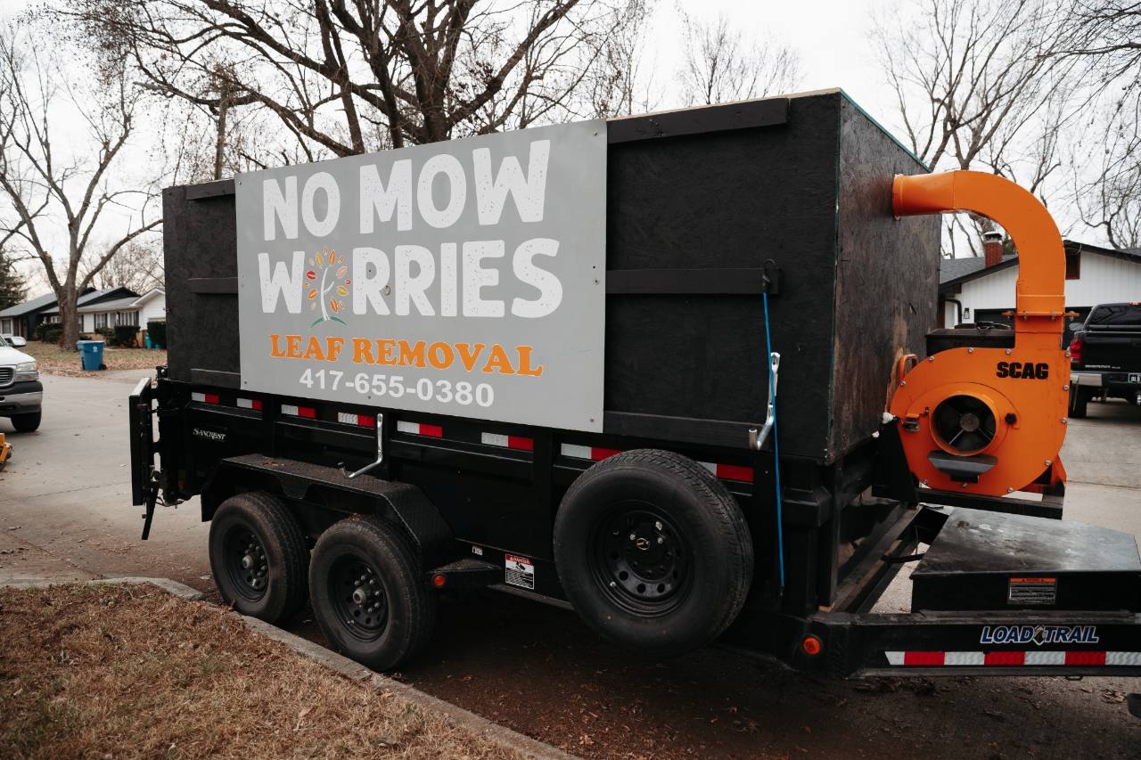 No Mow Worries leaf-removal trailer and collection equipment